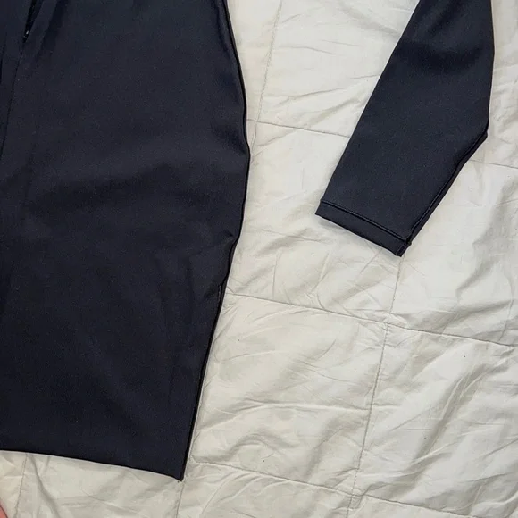 SKIMS ALL-IN-ONE LONG SLEEVE MID THIGH ONESIE - Picture 15 of 15